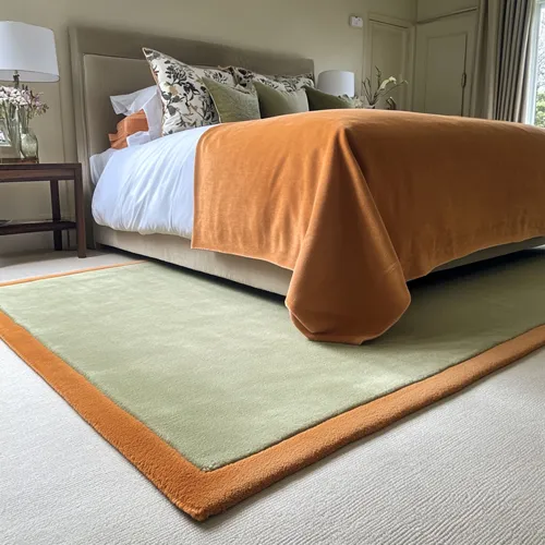 Pastel Green Wool Rug with Deep Orange Border
